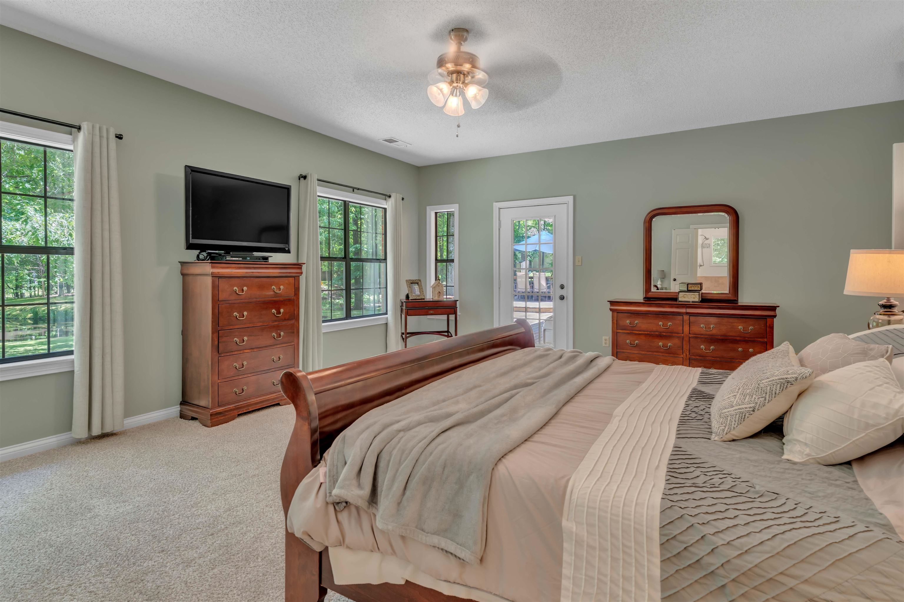 400 Great Oaks Road Eads, TN 38028 - Photo 20 of 40 a bedroom with a bed and a flat screen tv