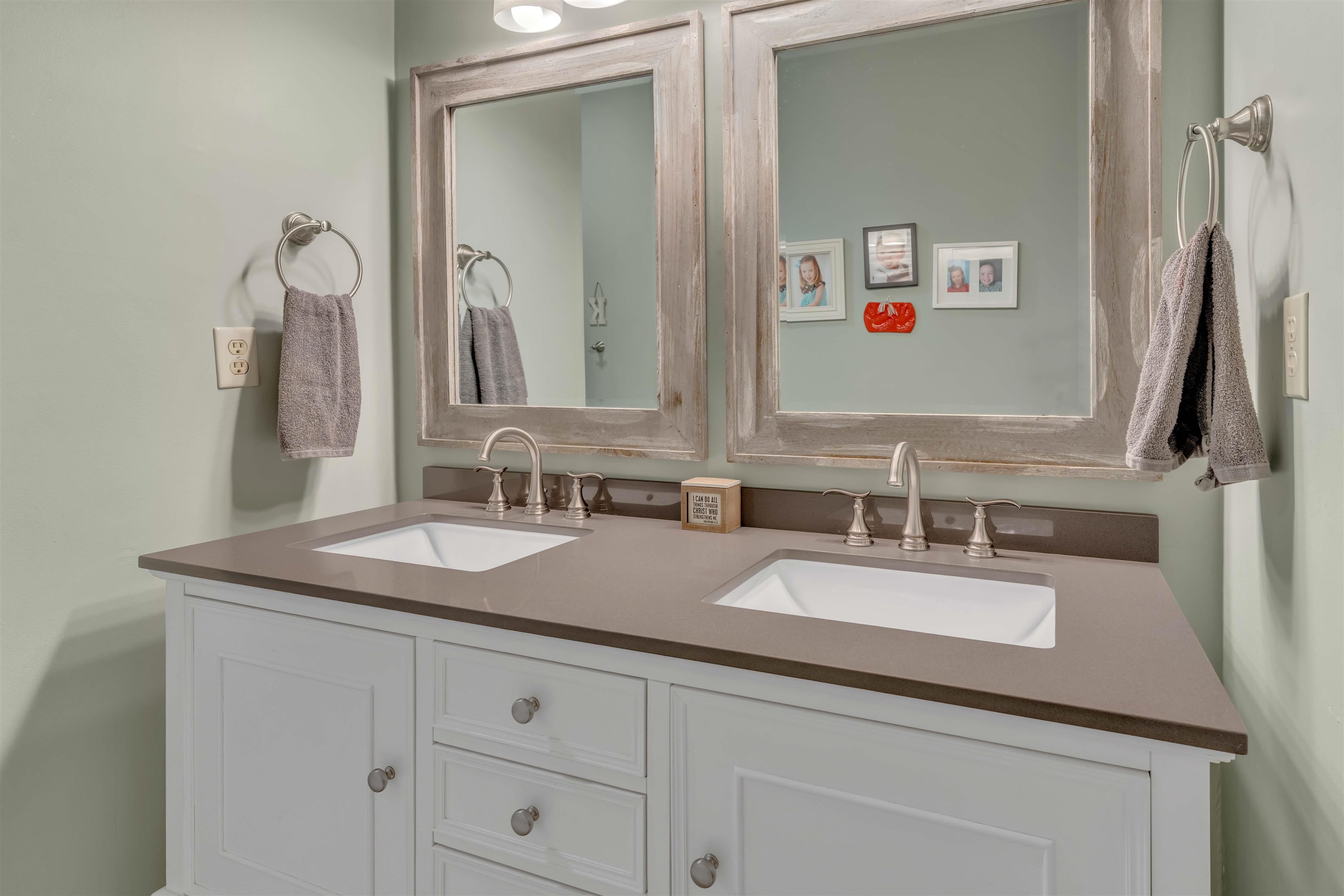 400 Great Oaks Road Eads, TN 38028 - Photo 27 of 40 a bathroom with double vanity sinks and a mirror