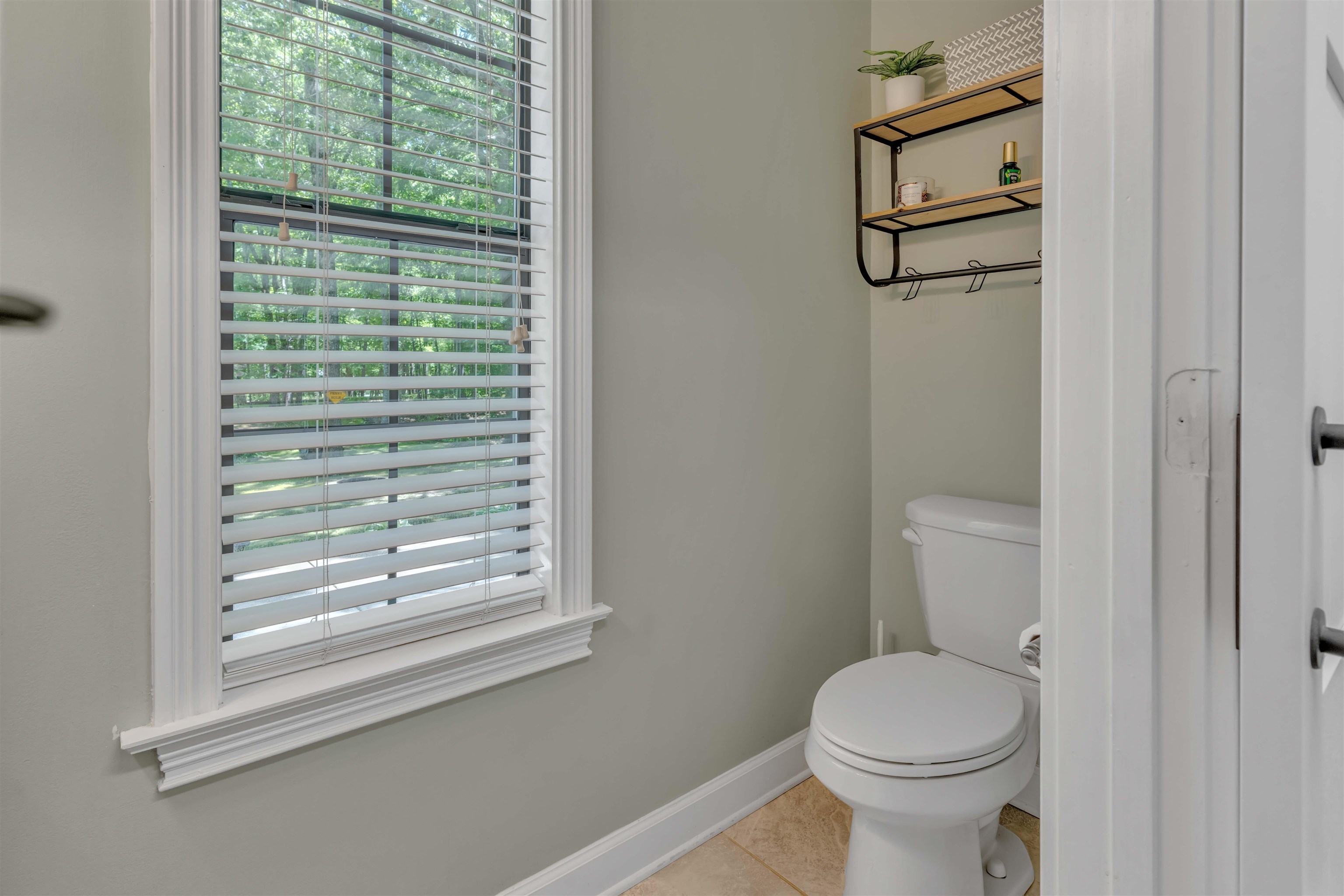 400 Great Oaks Road Eads, TN 38028 - Photo 31 of 40 a white toilet sitting next to a window