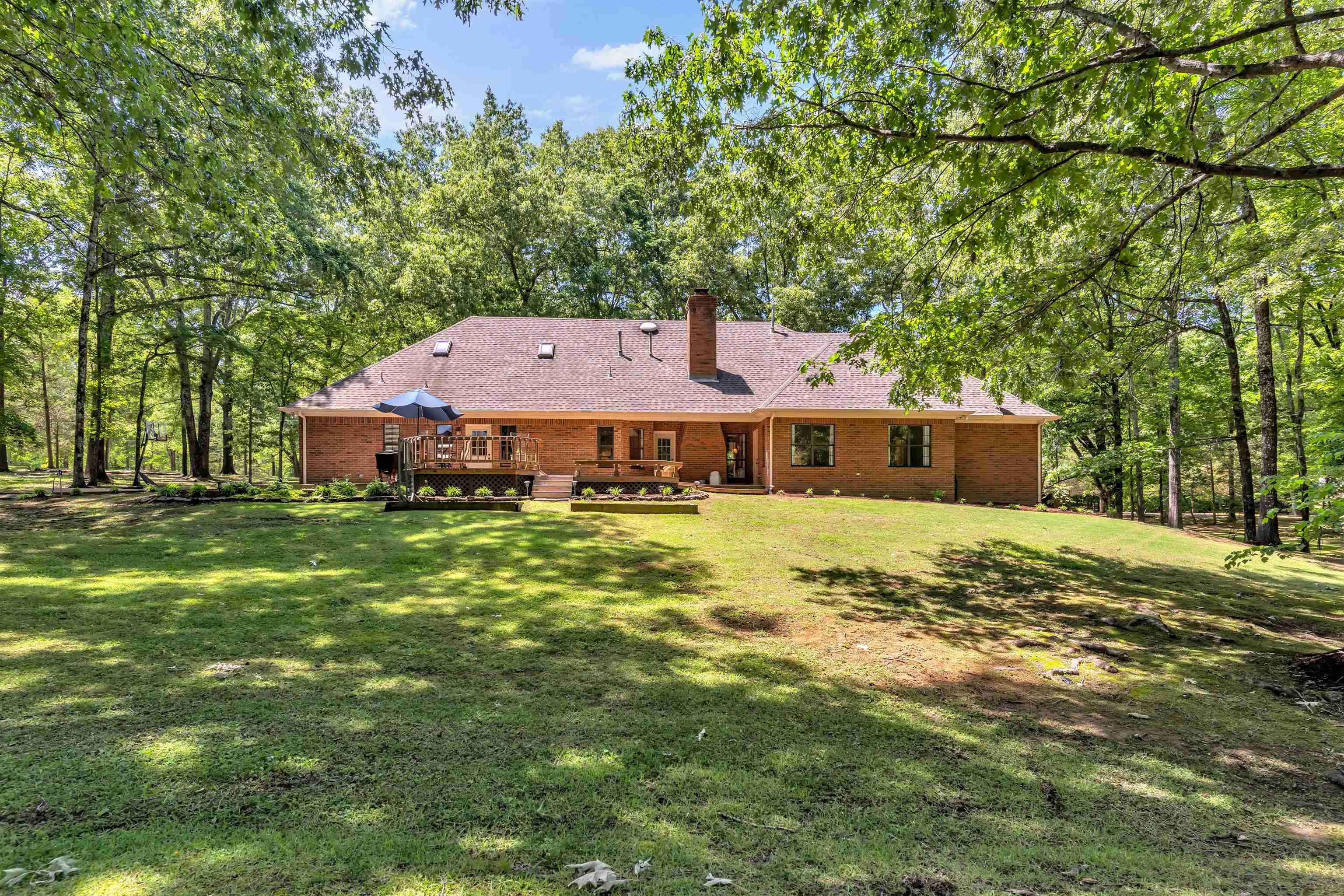 400 Great Oaks Road Eads, TN 38028 - Photo 36 of 40 a front view of a house with a garden