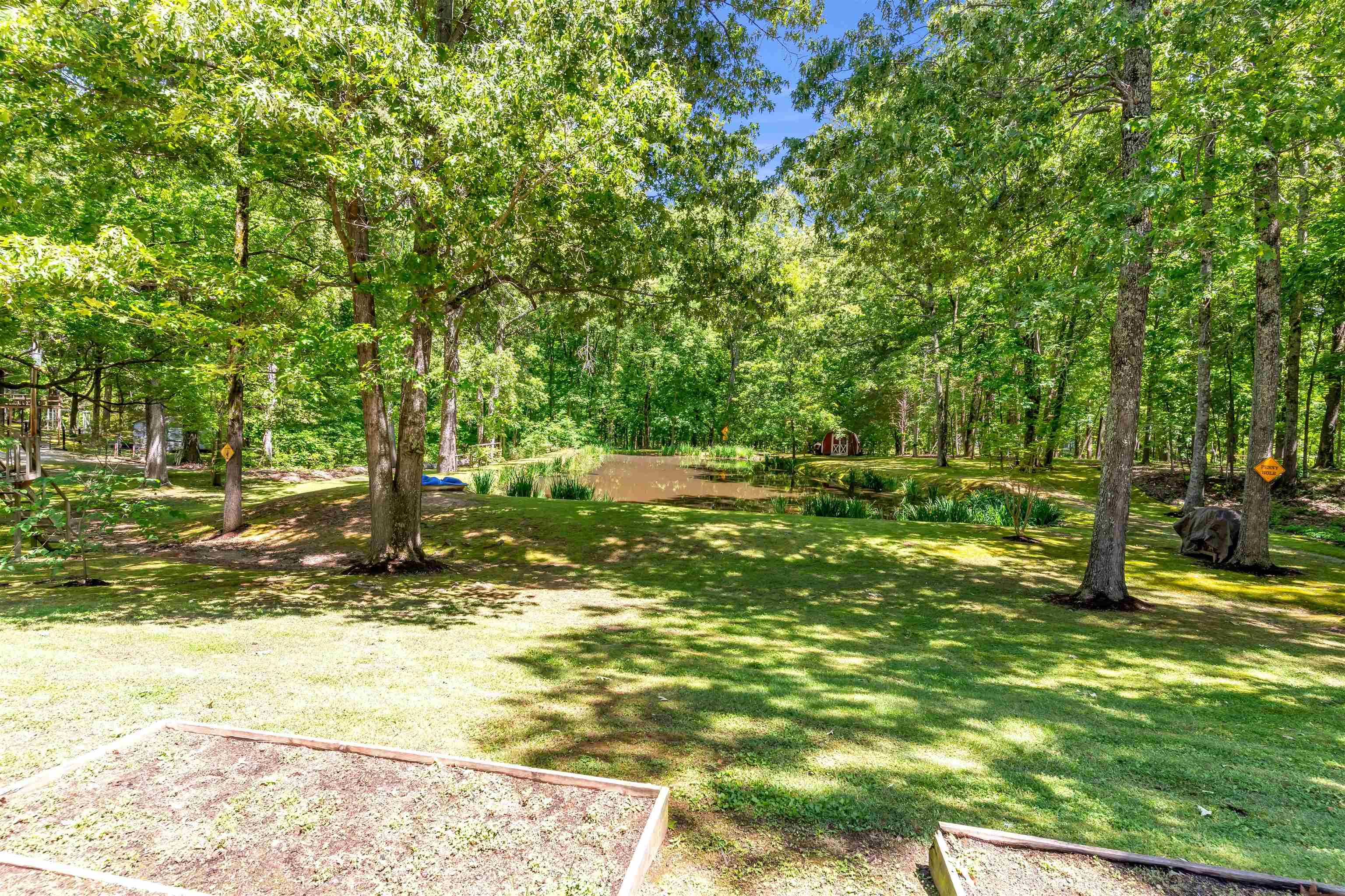 400 Great Oaks Road Eads, TN 38028 - Photo 38 of 40 a backyard of a house with lots of green space