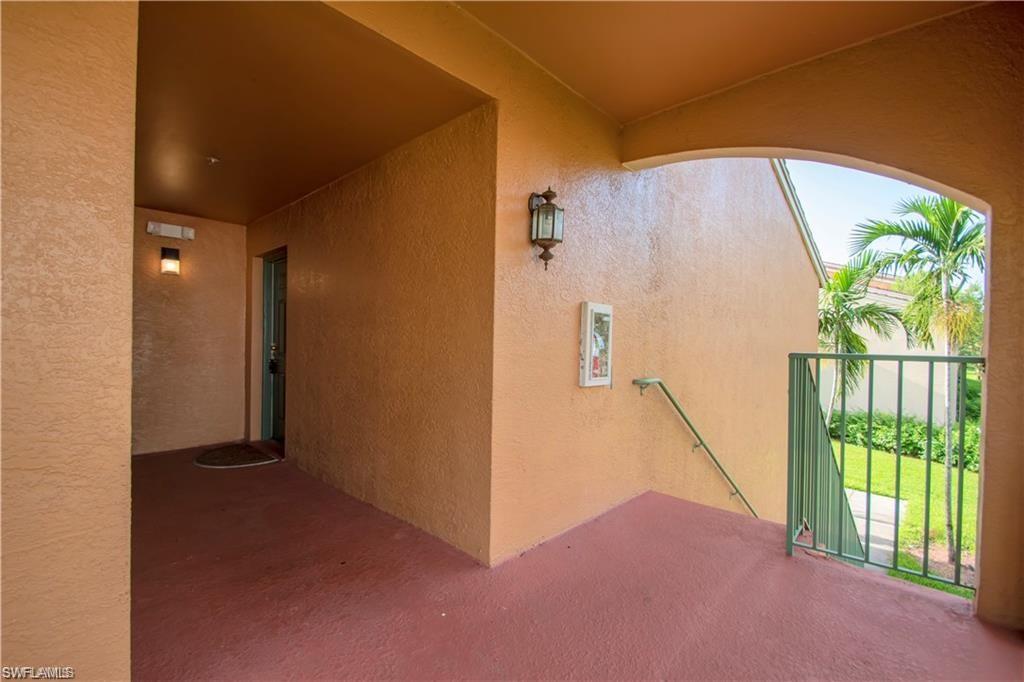 1220 Wildwood Lakes Boulevard, Unit 201 Naples, FL 34104 - Photo 34 of 35 View of exterior entry