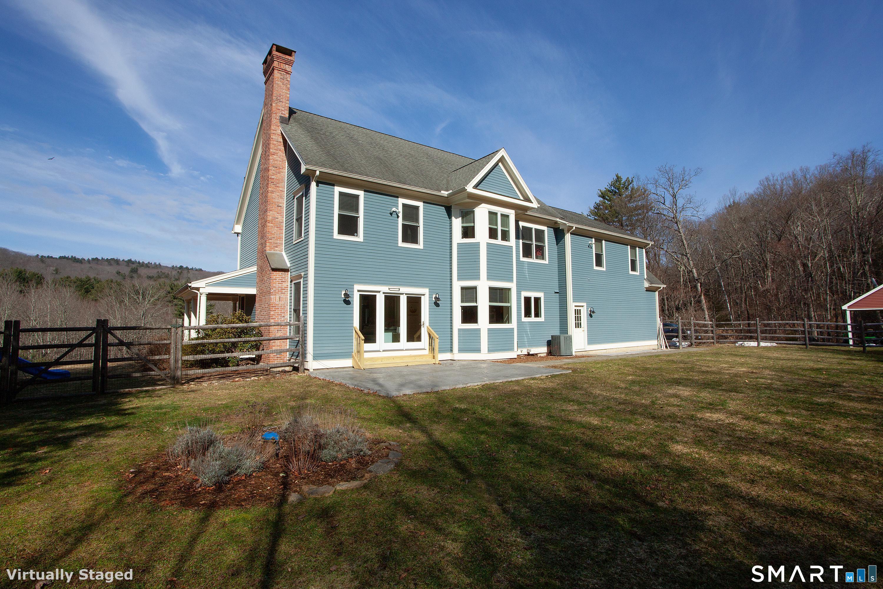 679 Cherry Brook Road Canton, CT 06019 - Photo 107 of 121 a front view of a house with a yard