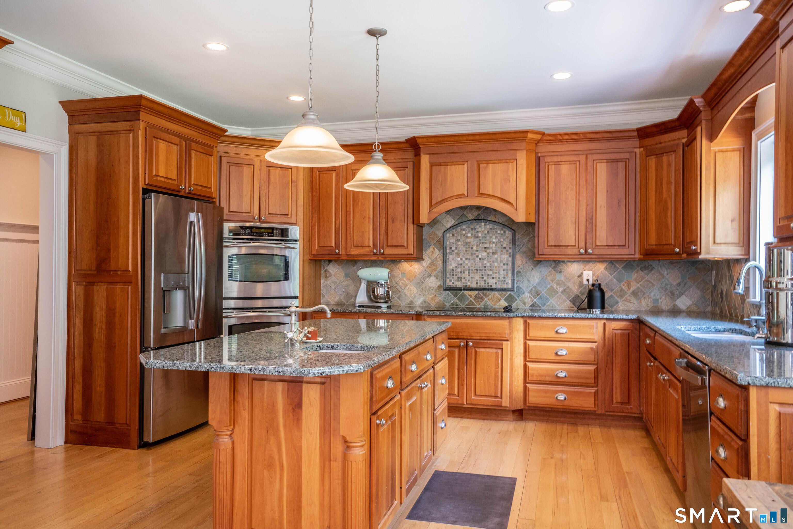 679 Cherry Brook Road Canton, CT 06019 - Photo 18 of 121 a kitchen with stainless steel appliances granite countertop a sink a stove and a refrigerator