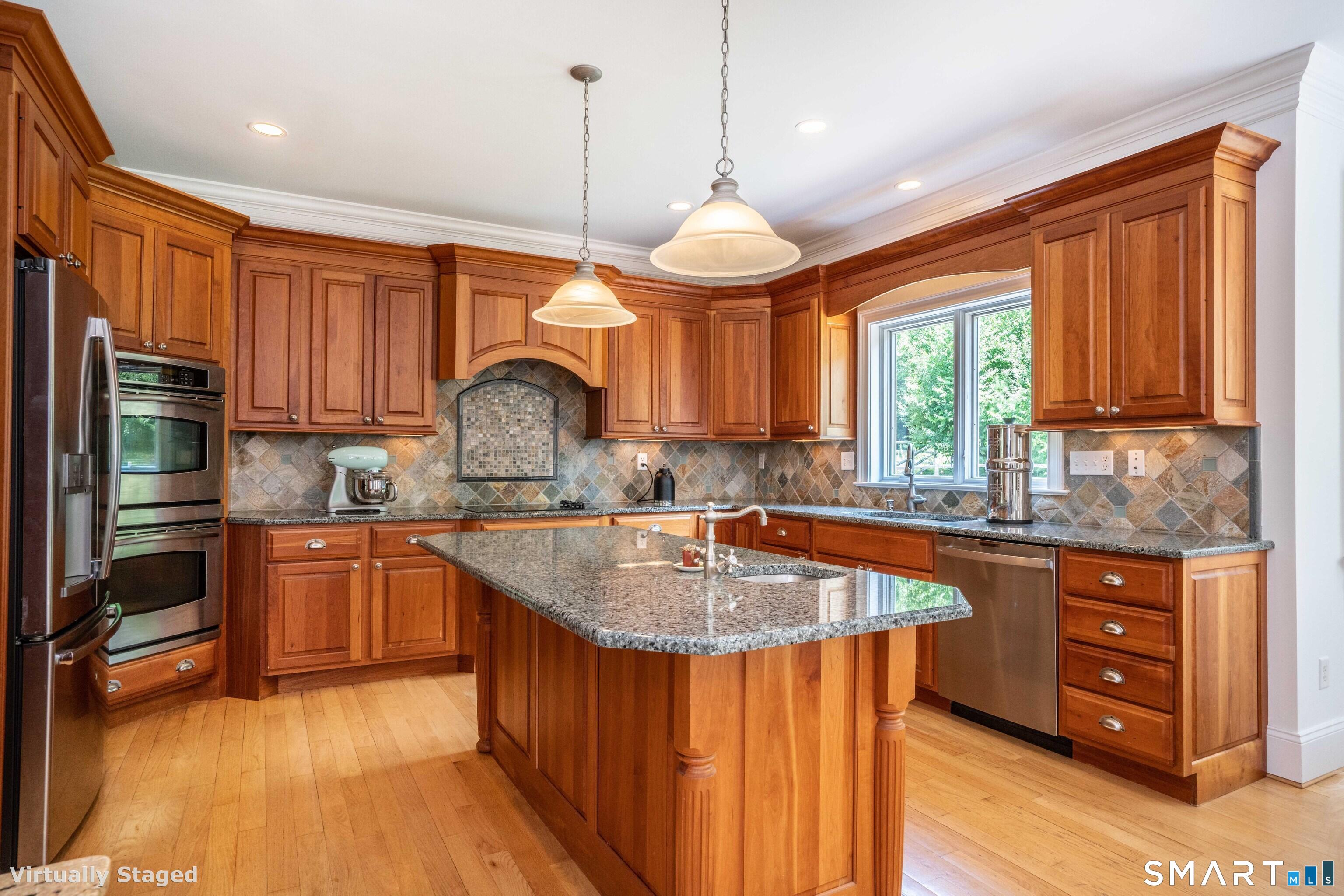 679 Cherry Brook Road Canton, CT 06019 - Photo 20 of 121 a kitchen with stainless steel appliances granite countertop a sink a stove and a wooden floors