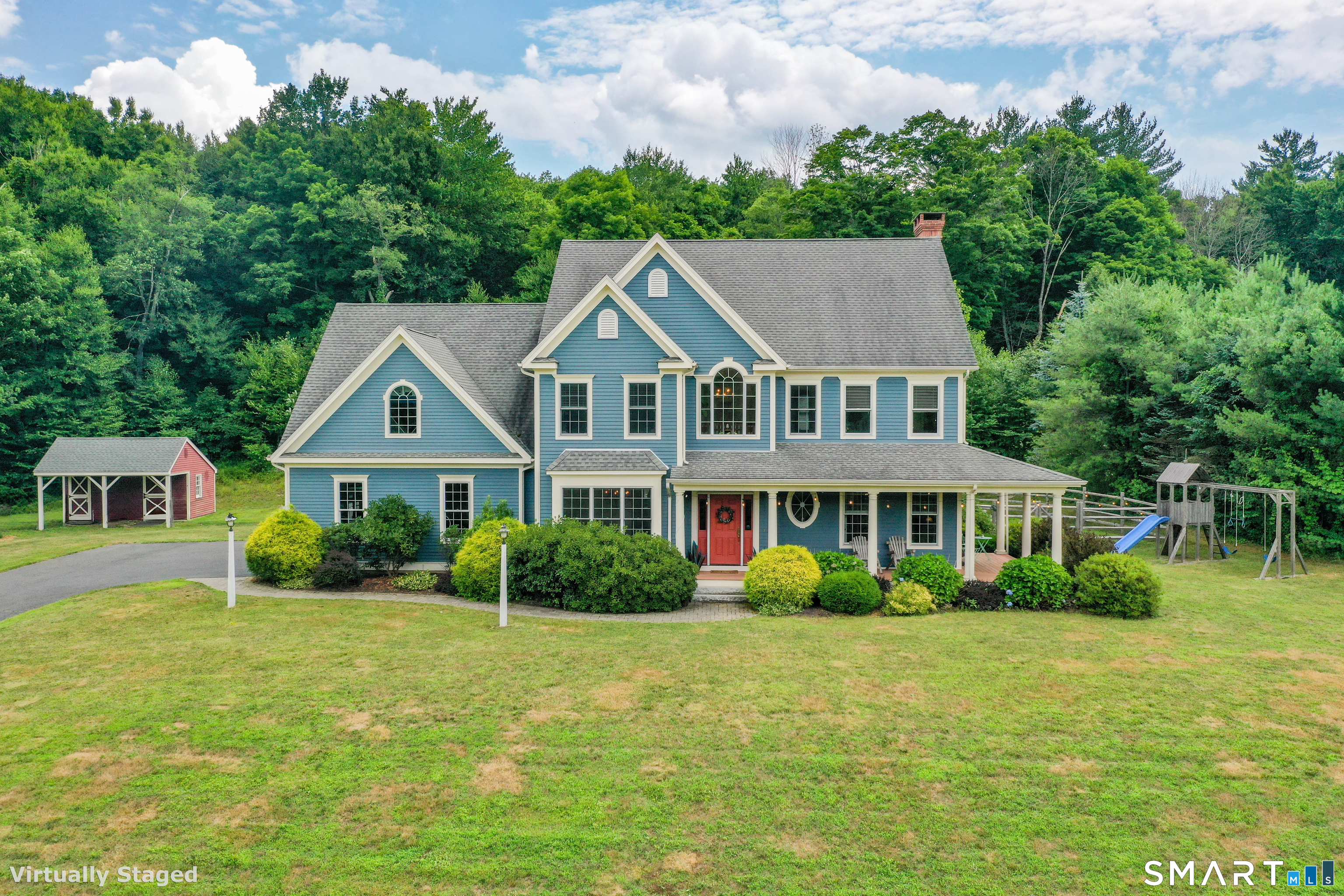 679 Cherry Brook Road Canton, CT 06019 - Photo 2 of 121 a front view of a house with a yard