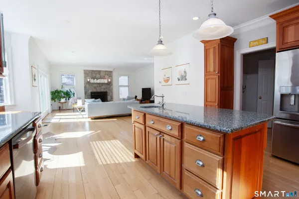 a utility room with sink dryer and washer