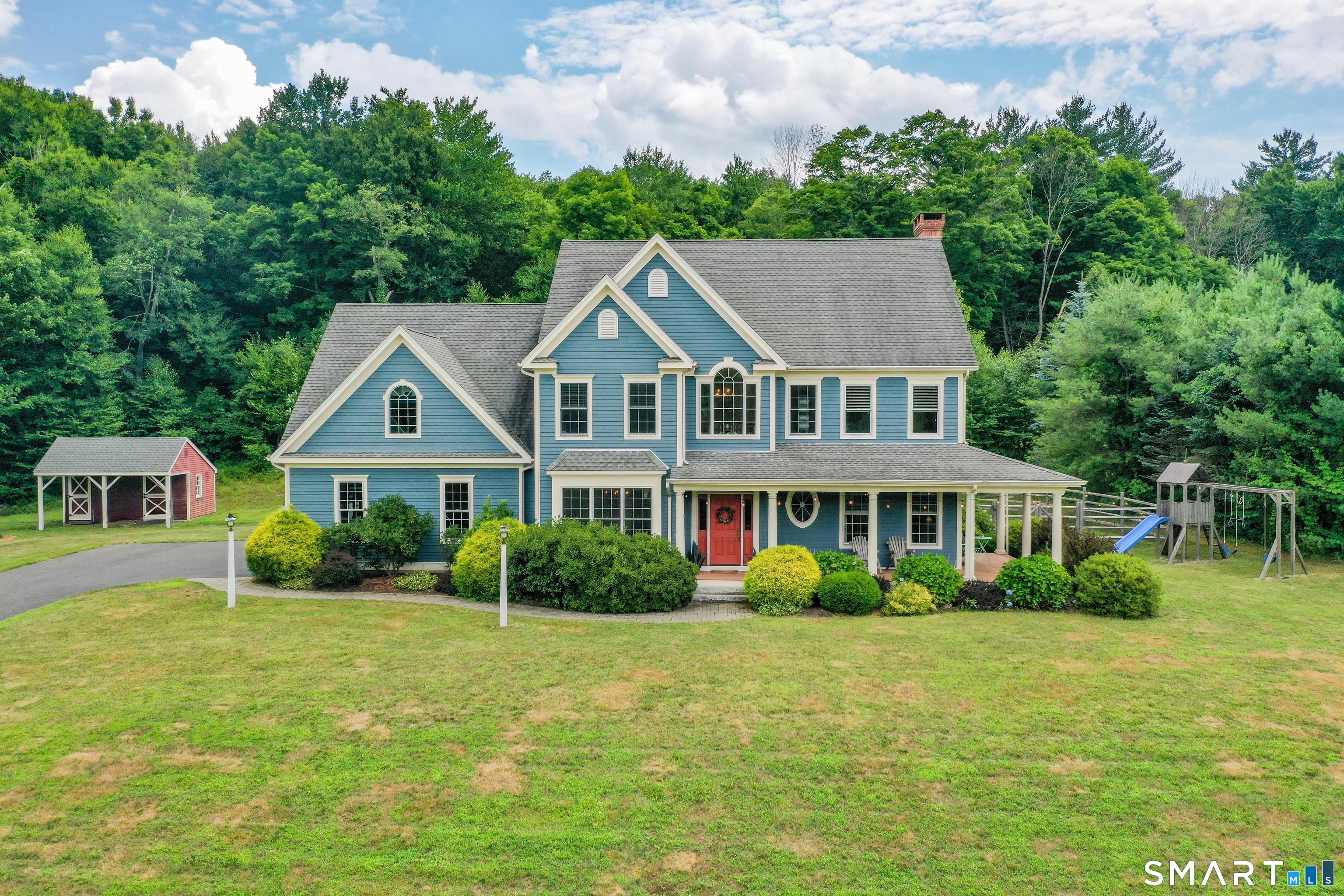 679 Cherry Brook Road Canton, CT 06019 - Photo 3 of 121 a front view of a house with a yard