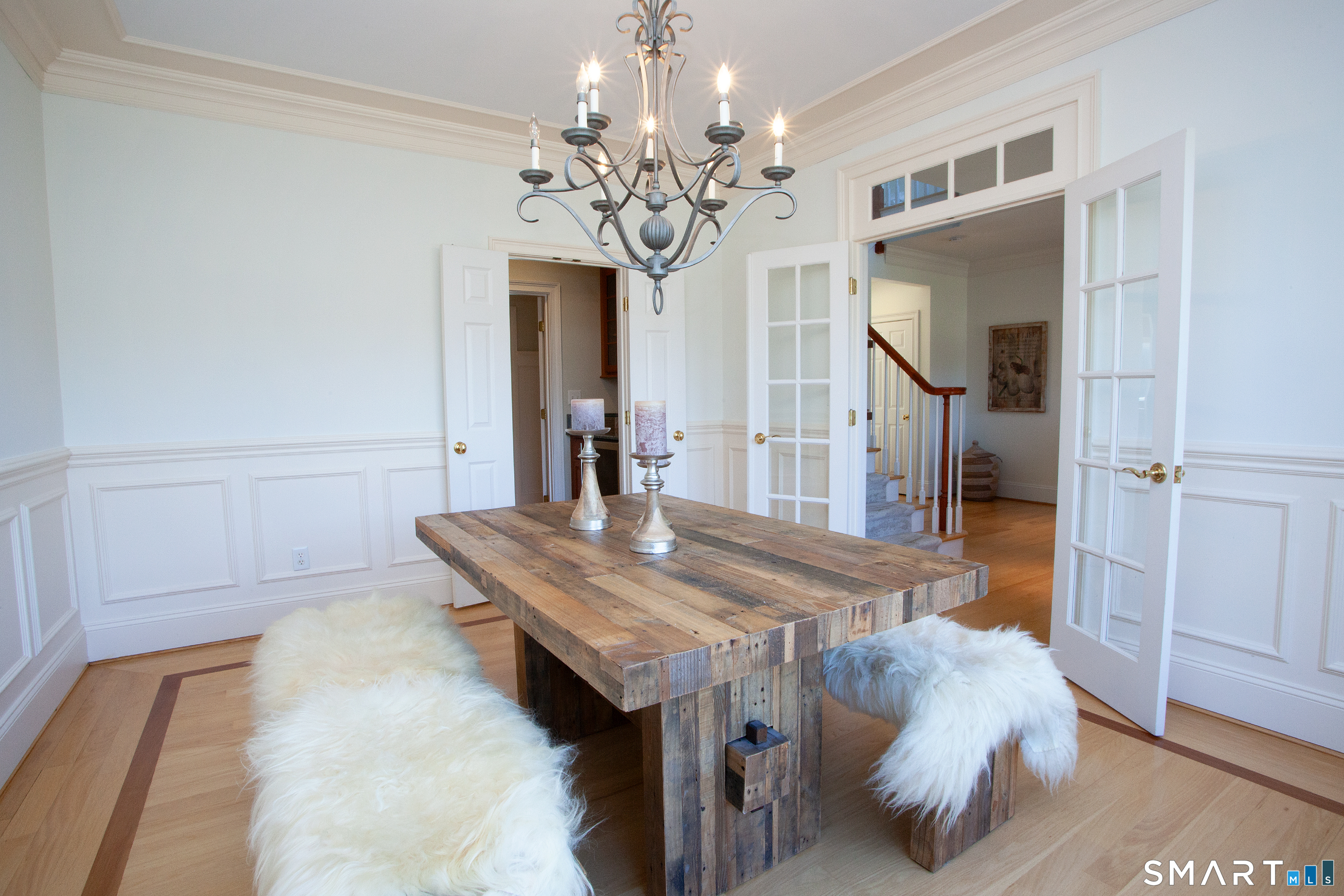 679 Cherry Brook Road Canton, CT 06019 - Photo 37 of 121 a bedroom with a bed and a chandelier