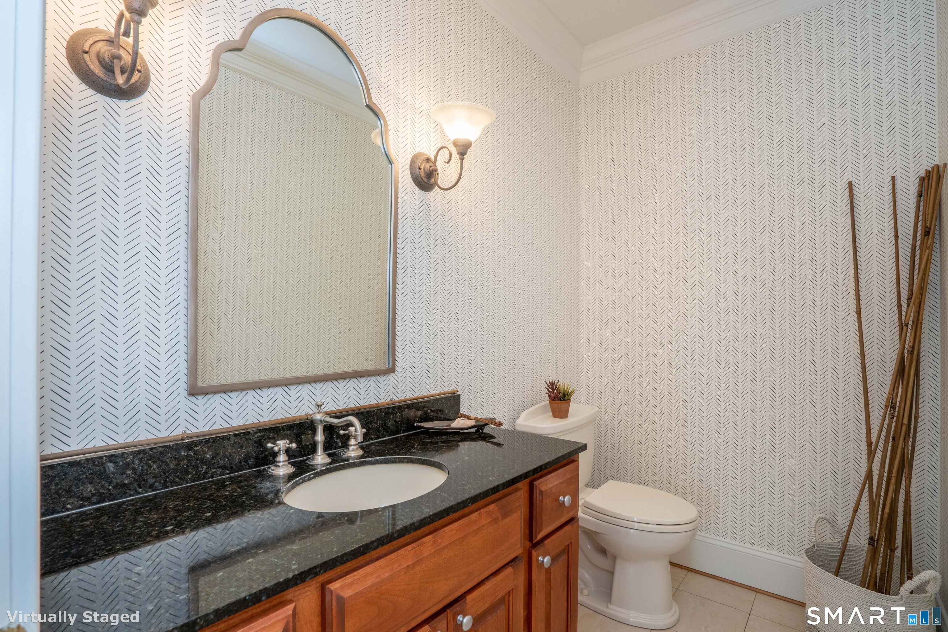 679 Cherry Brook Road Canton, CT 06019 - Photo 47 of 121 a bathroom with a granite countertop toilet sink and mirror