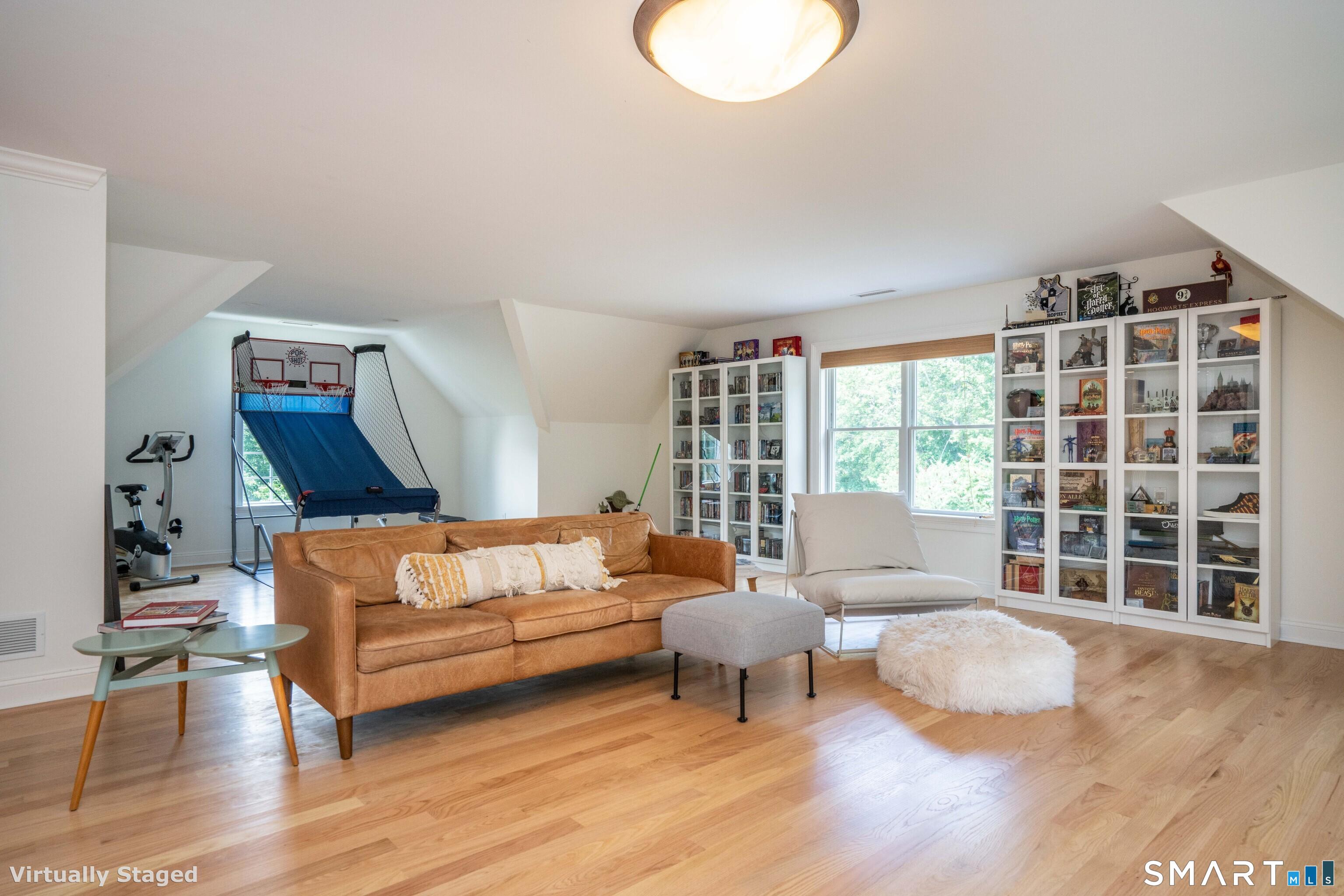 679 Cherry Brook Road Canton, CT 06019 - Photo 83 of 121 a living room with furniture and a large window