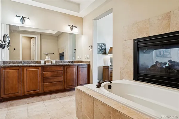 a bathroom with a shower and a sink