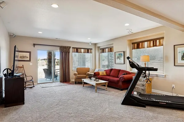 a kitchen with stainless steel appliances kitchen island granite countertop a stove and a sink