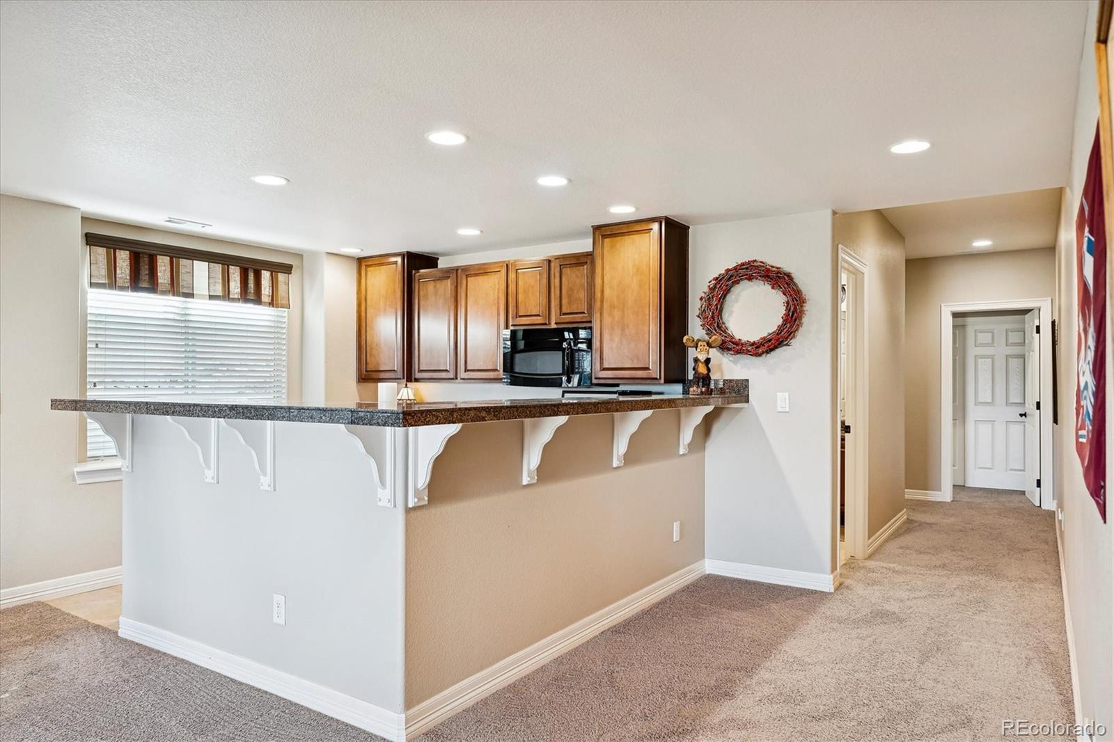 5228 Rialto Drive Parker, CO 80134 - Photo 38 of 50 a view of kitchen with sink and refrigerator