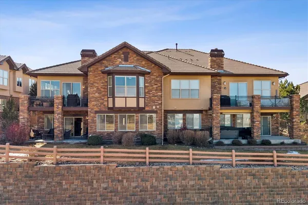 an aerial view of a house with a ocean view
