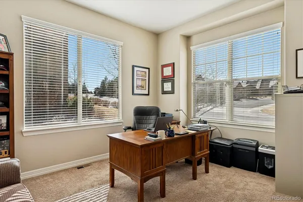 a dining room with furniture window wooden floor