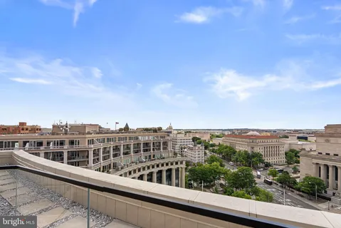 a view of a large building with a city view
