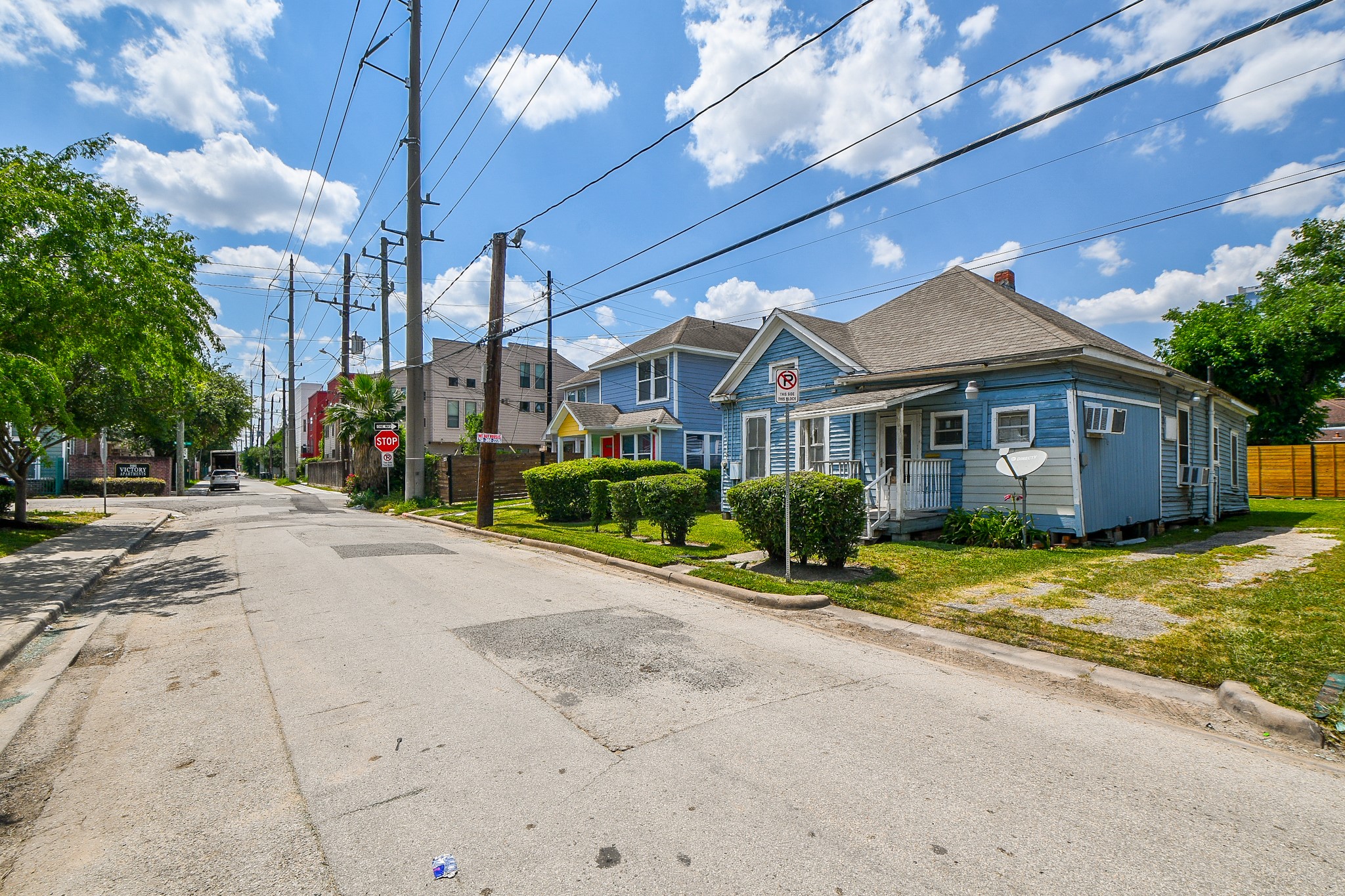 1318 Cleveland Street Houston, TX 77019 - Photo 4 of 7 a front view of a house with a yard and potted plants