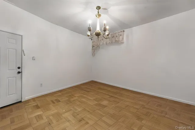 a kitchen with a refrigerator cabinet and a sink