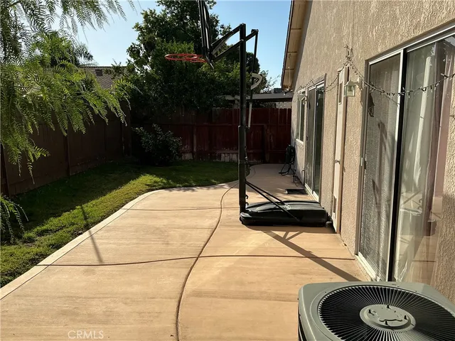 a bench sitting in the middle of a yard