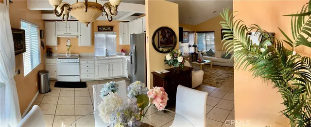 a view of living room with furniture and a fireplace
