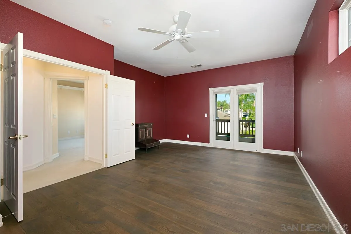2902 Rancho Rio Chico Carlsbad, CA 92009 - Photo 23 of 30 an empty room with windows and closet