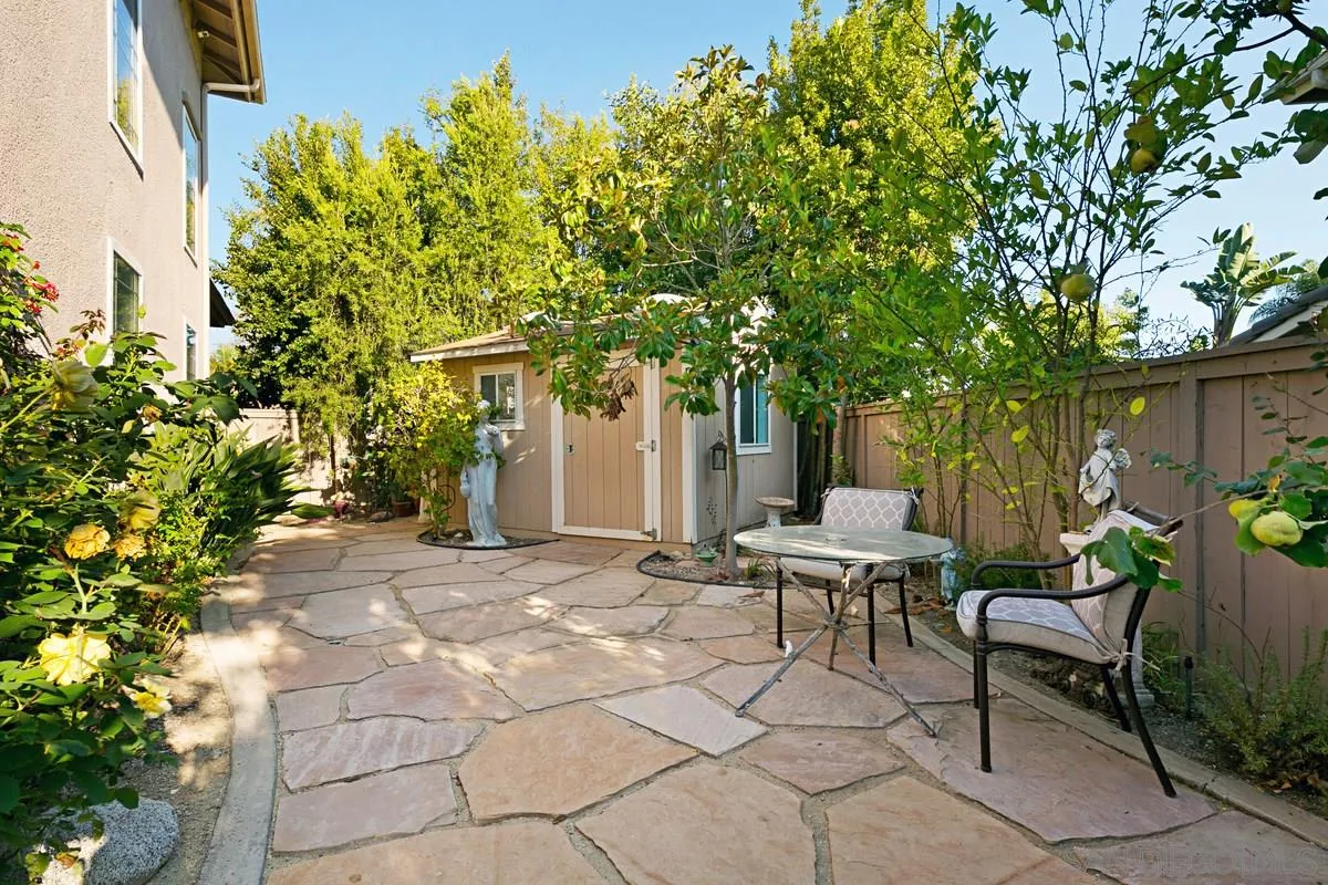 2902 Rancho Rio Chico Carlsbad, CA 92009 - Photo 30 of 30 a view of a house with backyard and sitting area