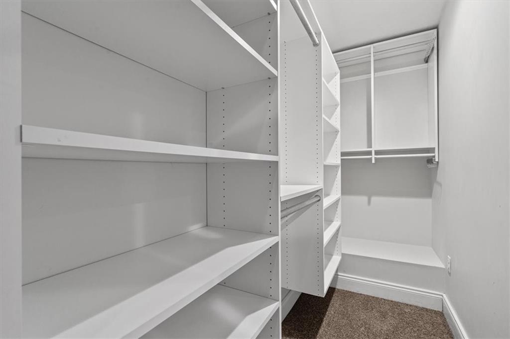 1302 Sarah Street Pittsburgh, PA 15203 - Photo 13 of 25 a view of walk in closet with empty racks