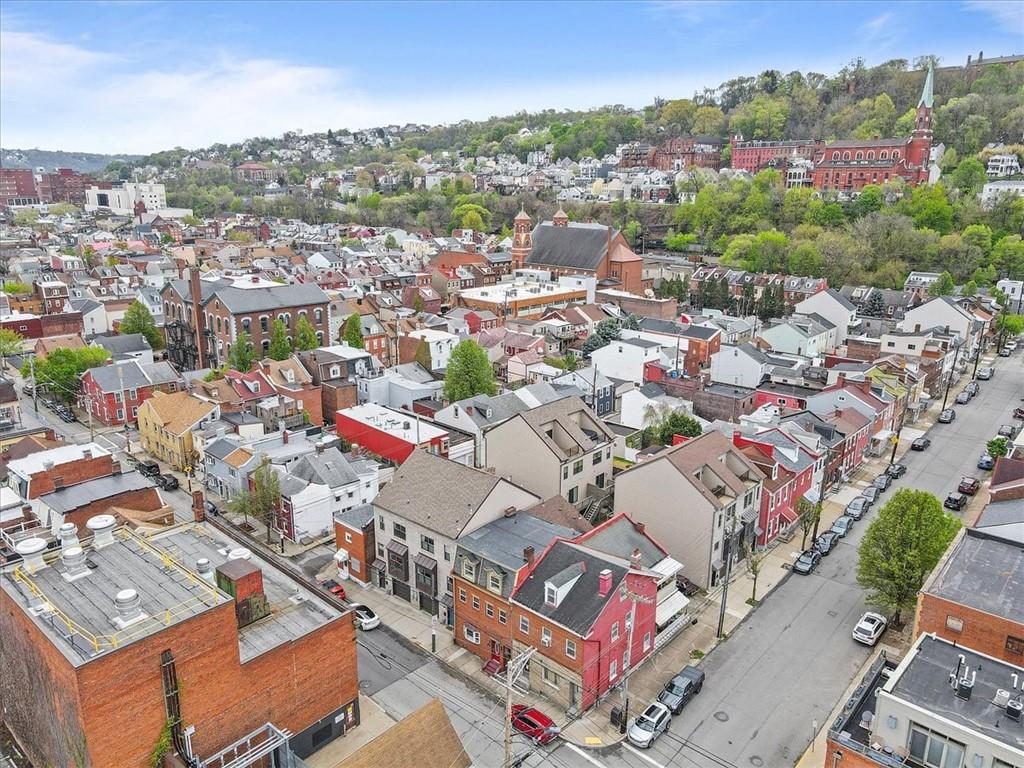 1302 Sarah Street Pittsburgh, PA 15203 - Photo 2 of 25 an aerial view of a city with lots of residential buildings