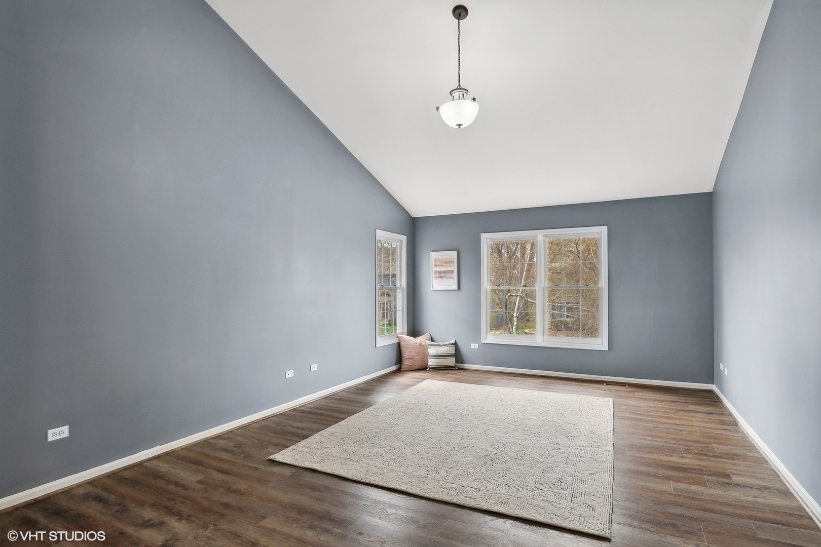 665 Angelo Avenue Gurnee, IL 60031 - Photo 18 of 34 an empty room with wooden floor and windows