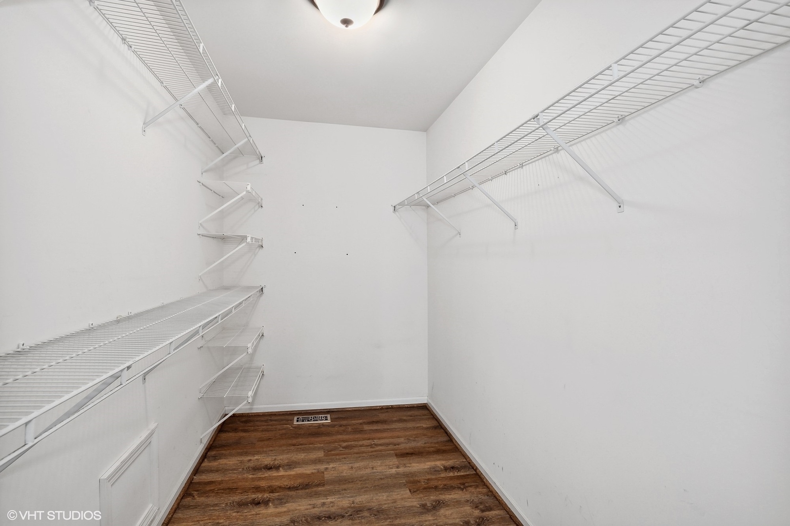 665 Angelo Avenue Gurnee, IL 60031 - Photo 19 of 34 a view of an empty walk in closet