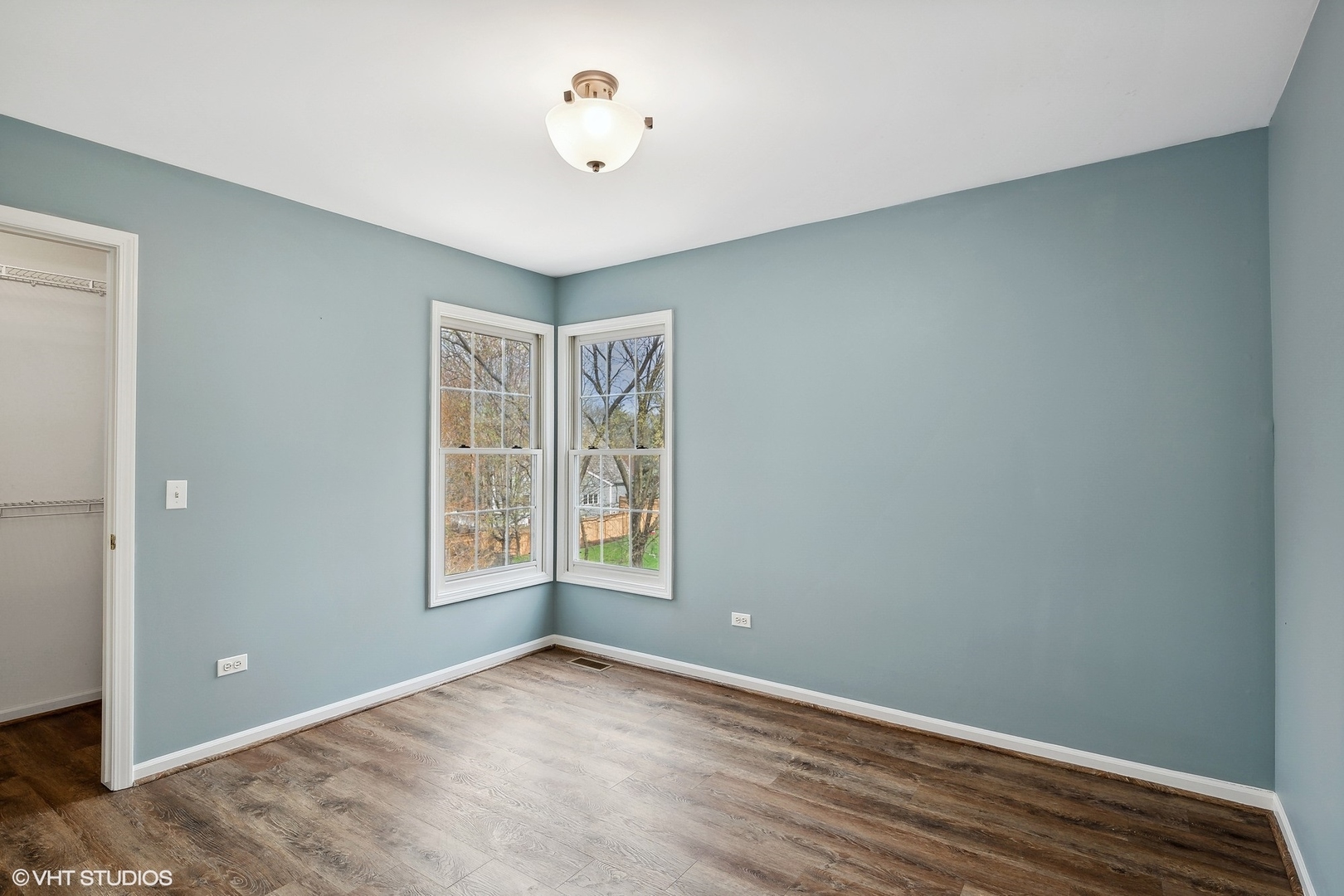 665 Angelo Avenue Gurnee, IL 60031 - Photo 24 of 34 an empty room with windows