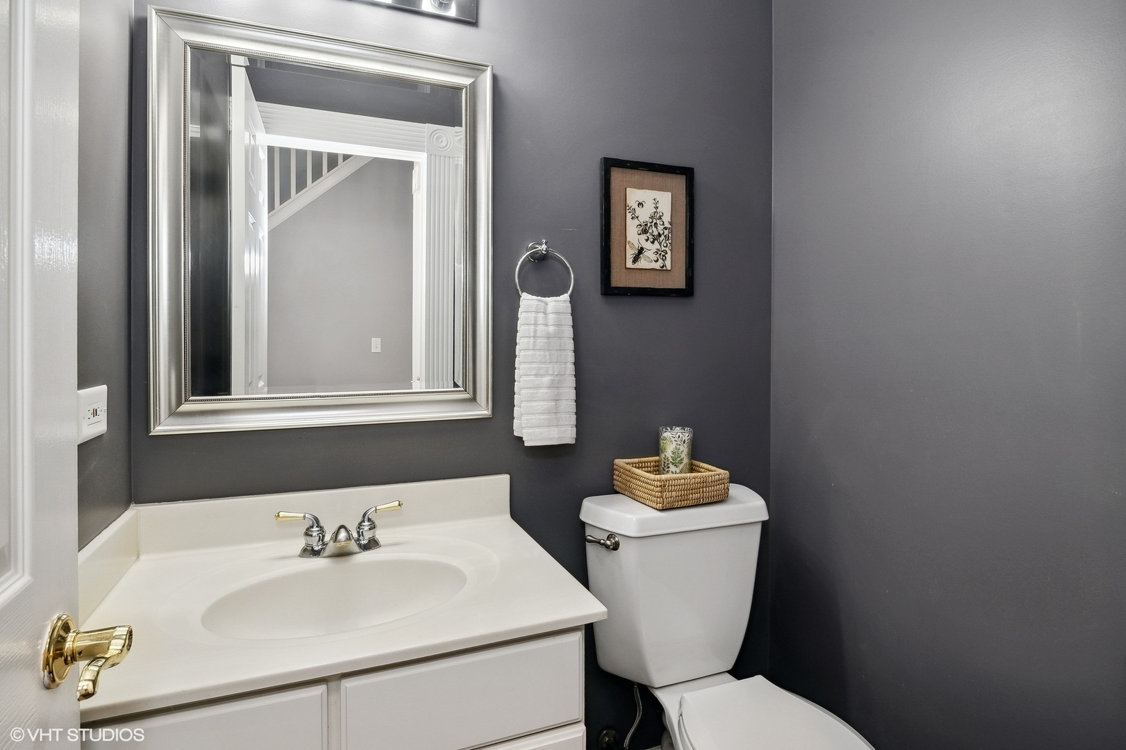 665 Angelo Avenue Gurnee, IL 60031 - Photo 28 of 34 a bathroom with a sink mirror and toilet