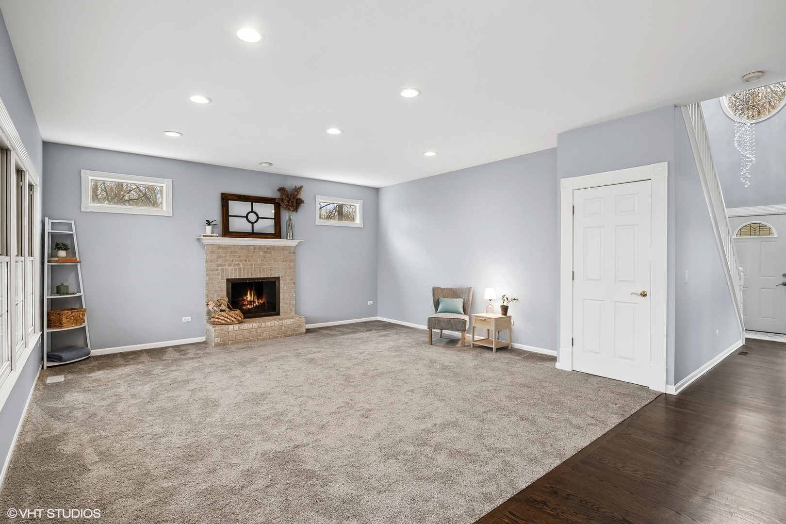 665 Angelo Avenue Gurnee, IL 60031 - Photo 8 of 34 an empty room with furniture and a fireplace