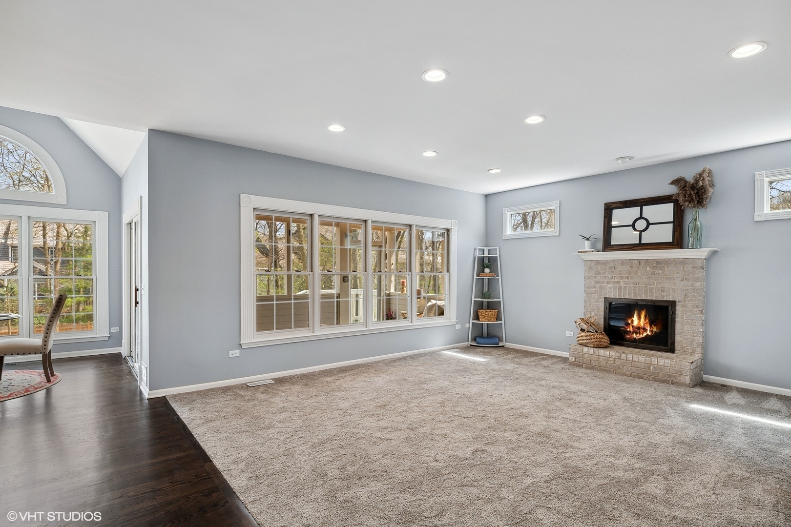 665 Angelo Avenue Gurnee, IL 60031 - Photo 9 of 34 a view of an empty room with wooden floor and a window