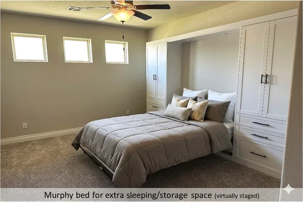 a bedroom with a bed and a night stand