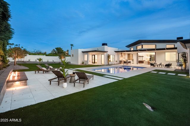 a view of a workspace with furniture