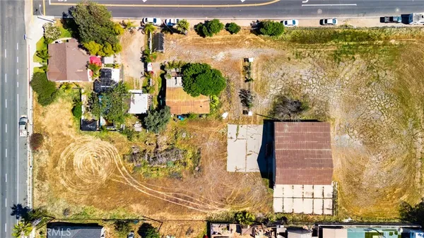 an aerial view of residential building and ocean