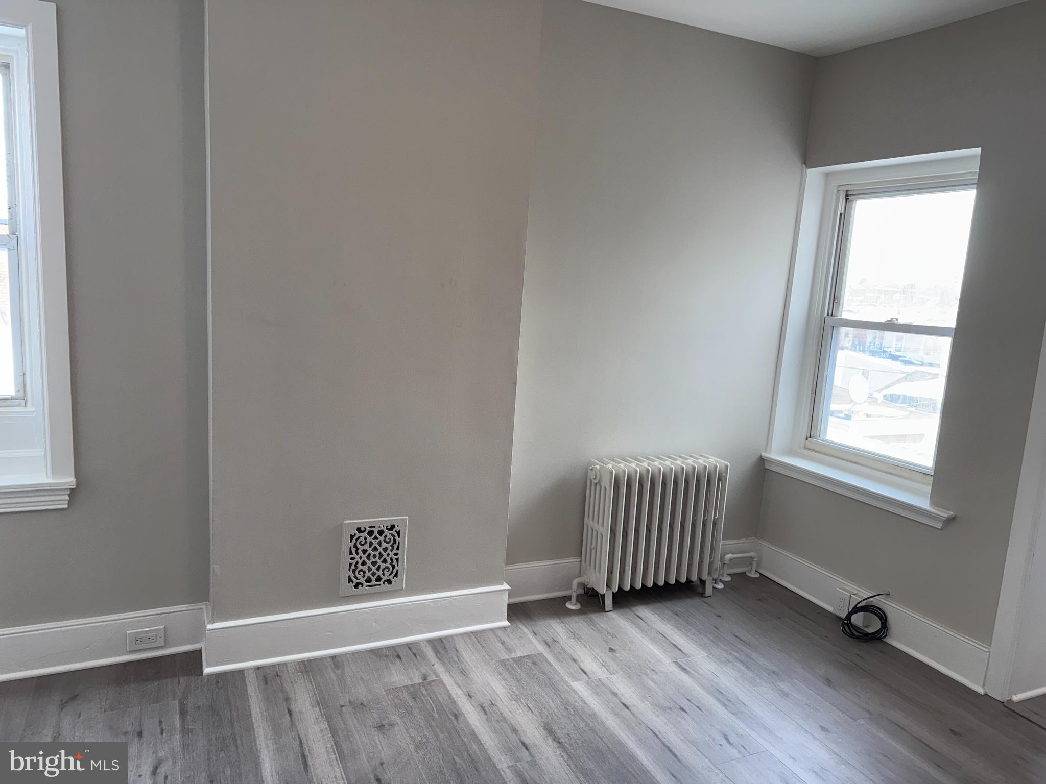 706 Chain Street, Unit 3 Norristown, PA 19401 - Photo 14 of 15 an empty room with a window