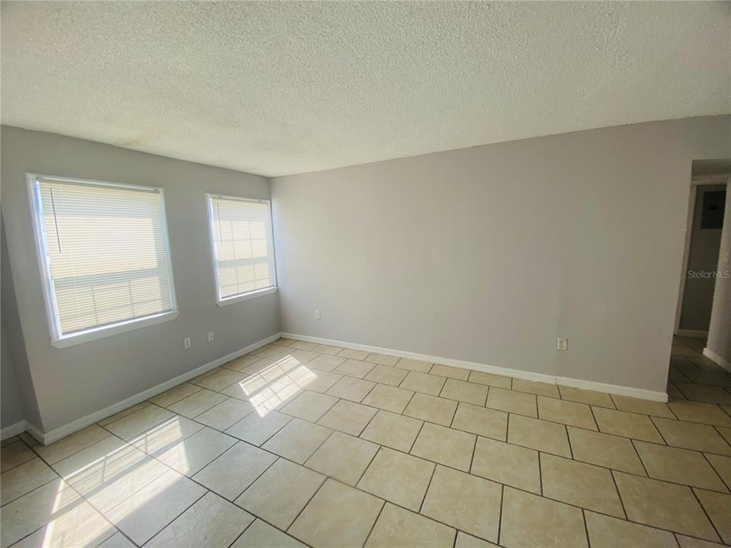 2771 L B McLeod Road, Unit A Orlando, FL 32805 - Photo 2 of 17 a view of an empty room and window