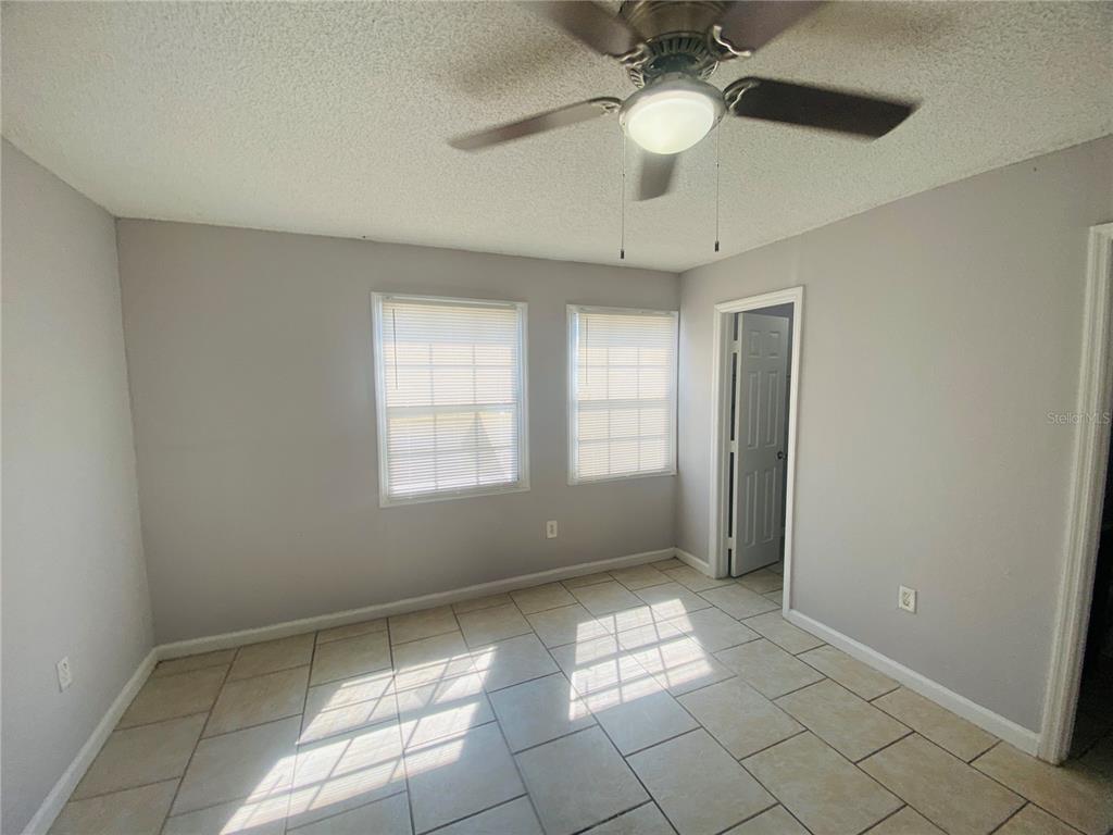 2771 L B McLeod Road, Unit A Orlando, FL 32805 - Photo 10 of 17 a view of an empty room with a window