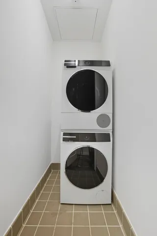 a bathroom with a bathtub a sink and a shower
