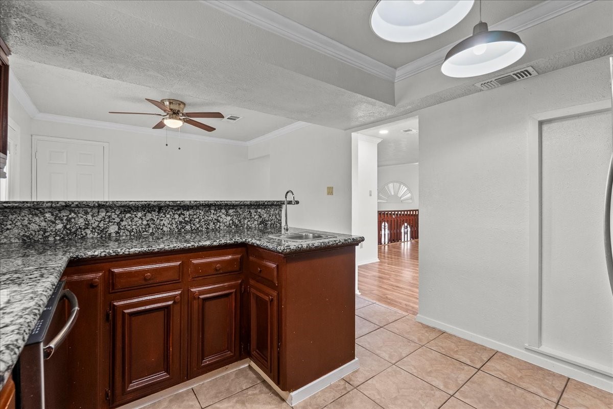 430 Redway Lane Houston, TX 77598 - Photo 40 of 43 a kitchen with a sink and cabinets