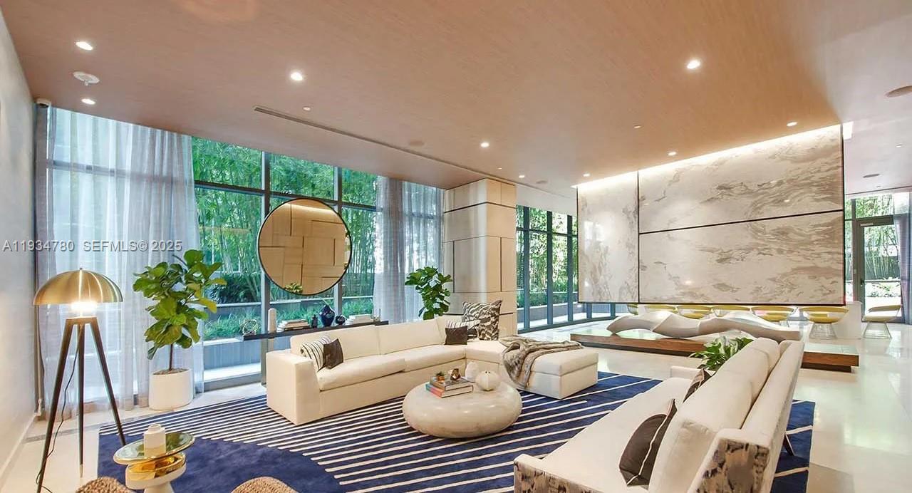 45 Southwest 9th Street, Unit 3210 Miami, FL 33130 - Photo 20 of 20 a living room with furniture and a large window