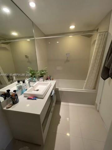 45 Southwest 9th Street, Unit 3210 Miami, FL 33130 - Photo 8 of 20 a bathroom with a sink a toilet and shower