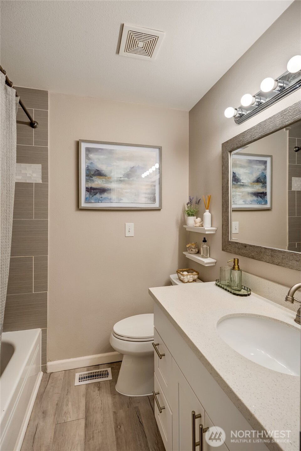 825 Index Court Northeast Renton, WA 98056 - Photo 25 of 40 a bathroom with a sink toilet and shower