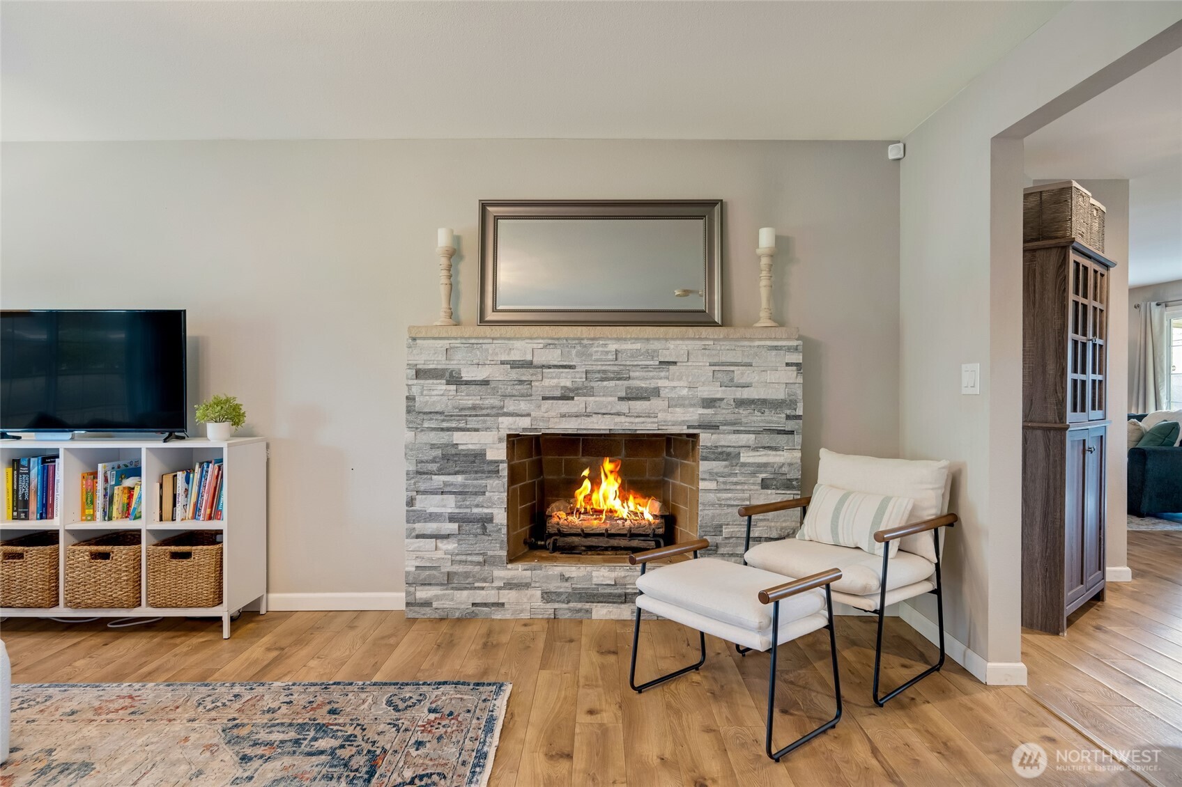 825 Index Court Northeast Renton, WA 98056 - Photo 6 of 40 a living room with furniture and a fireplace