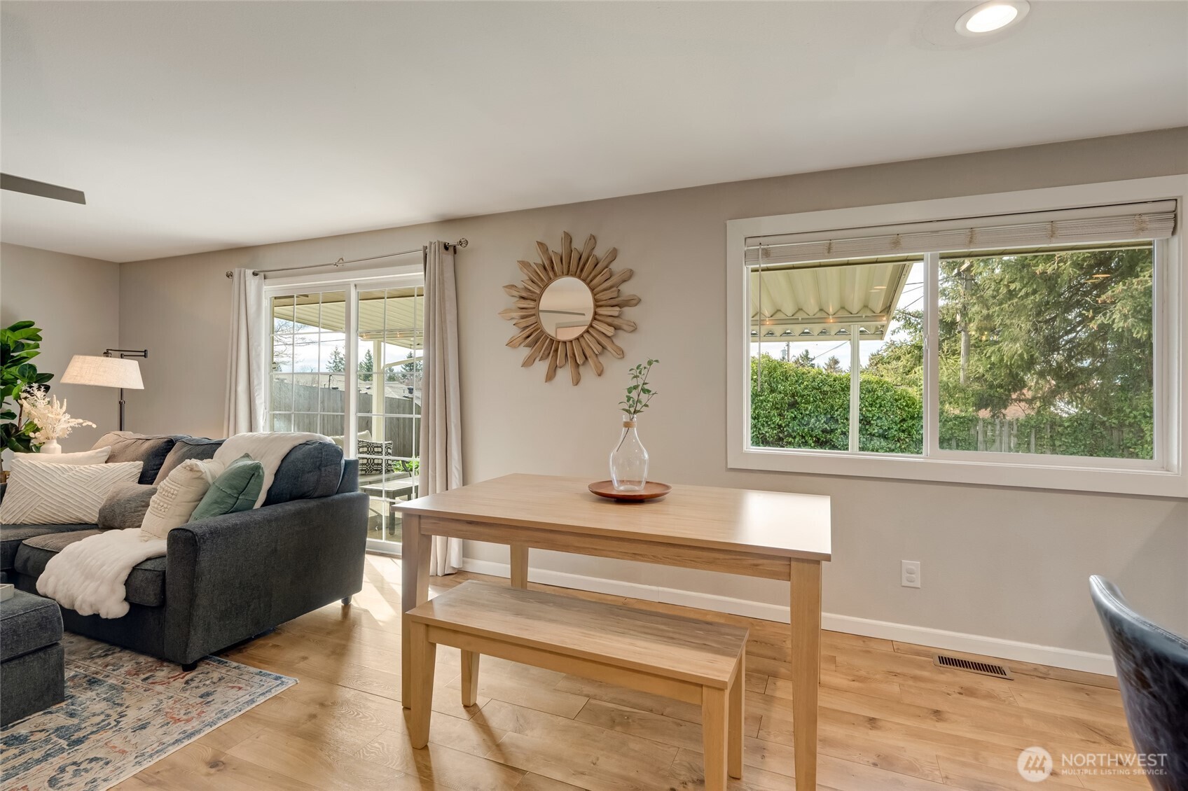 825 Index Court Northeast Renton, WA 98056 - Photo 9 of 40 a living room with furniture and a large window