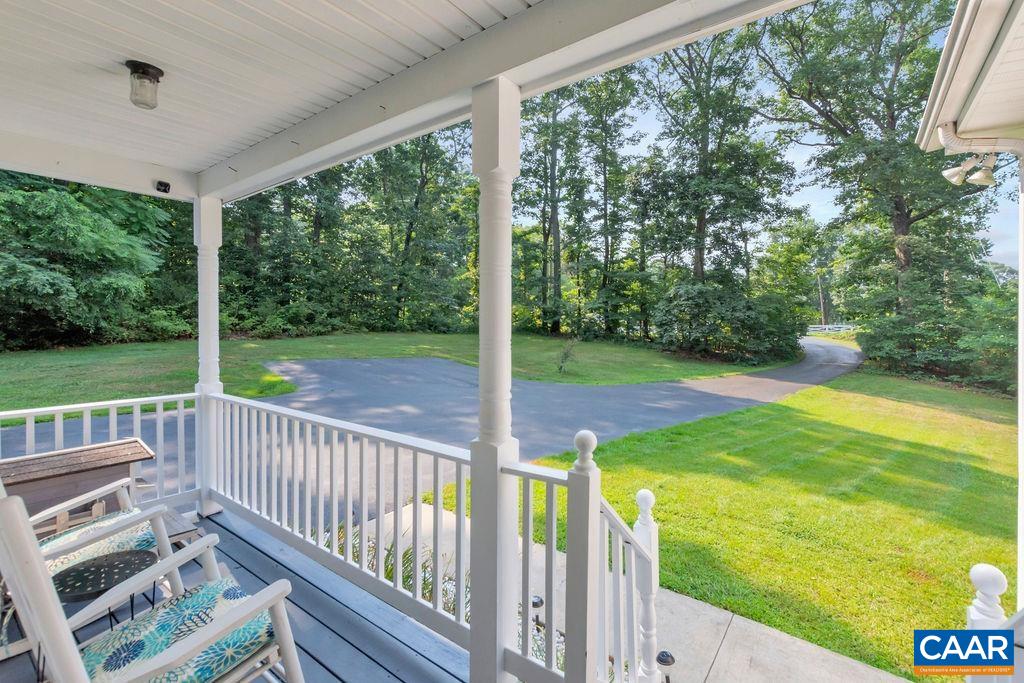 6863 Amicus Road Ruckersville, VA 22968 - Photo 42 of 42 a view of a porch with a yard