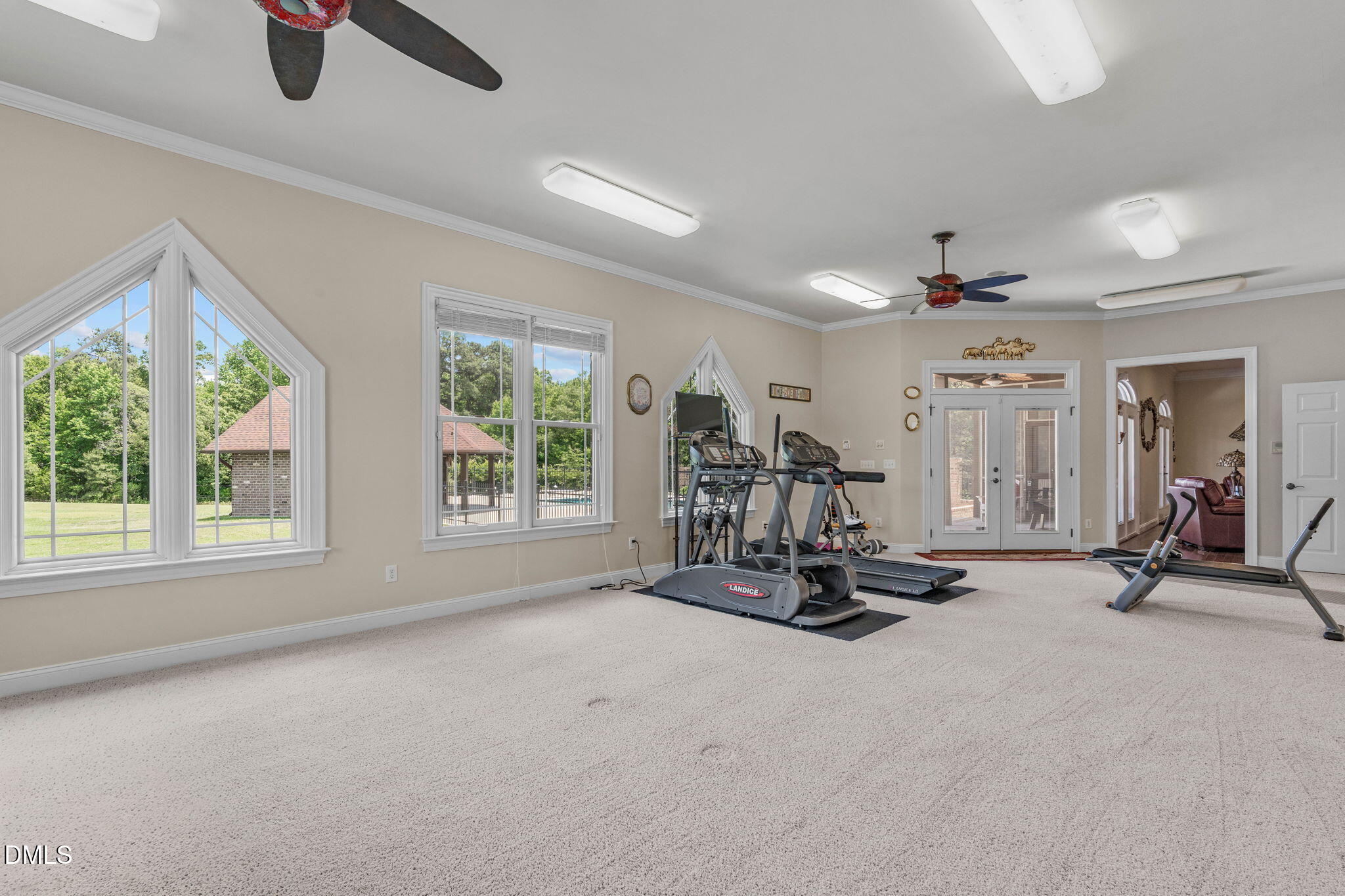10917 Jordan Road Raleigh, NC 27603 - Photo 25 of 58 a view of a room with gym equipment